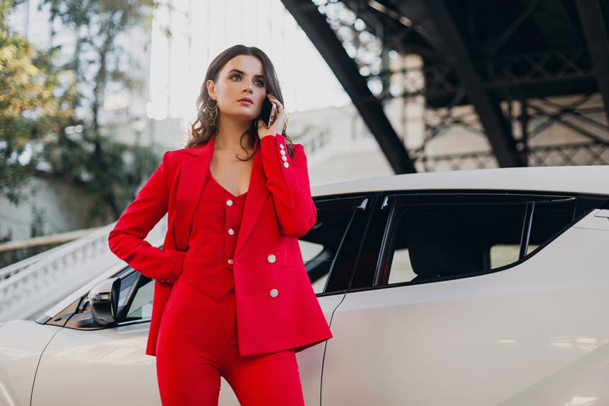 beautiful sexy woman red suit posing car talking business phone